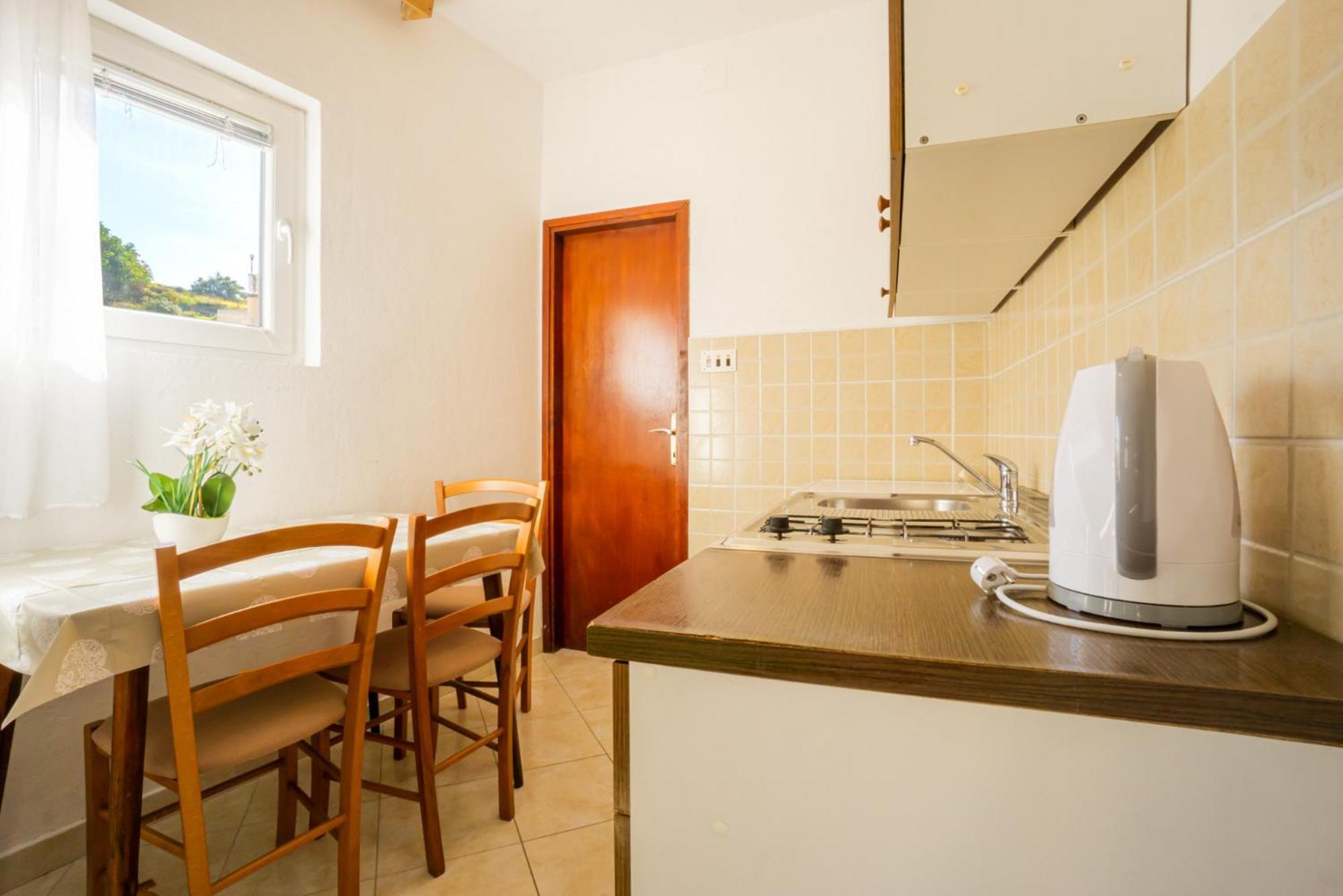 Apartment And Room Bacic Metajna Room photo